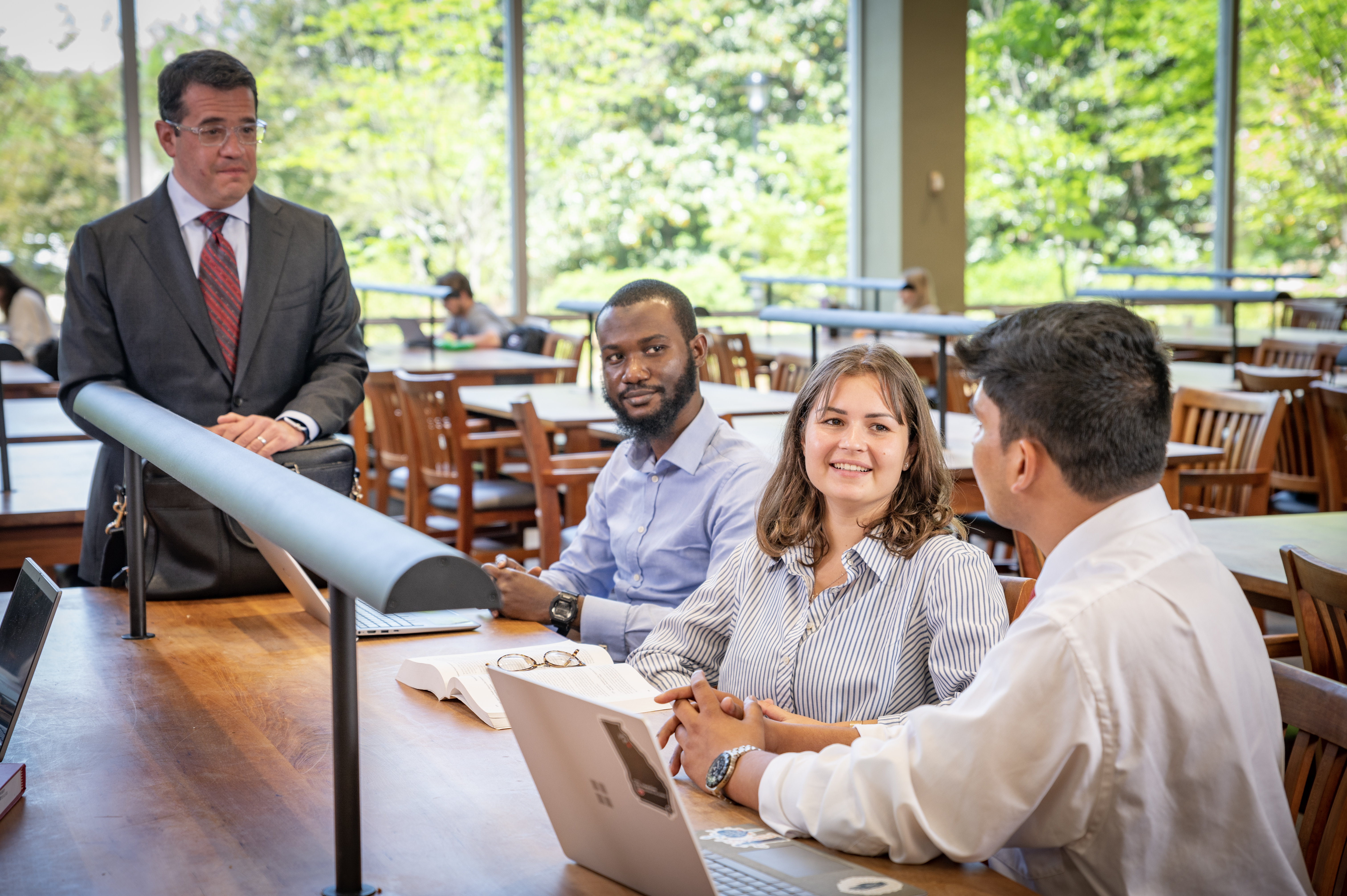 Students talking in the library.