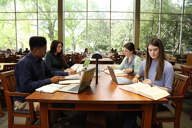 students studying at desk