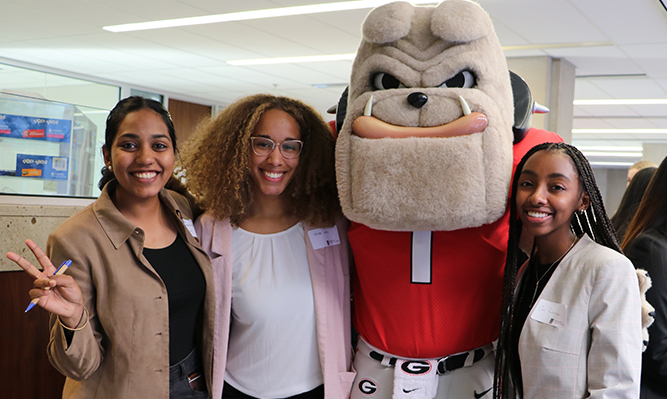 three female students with Hairy Dog