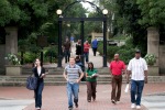 Arch with students walking