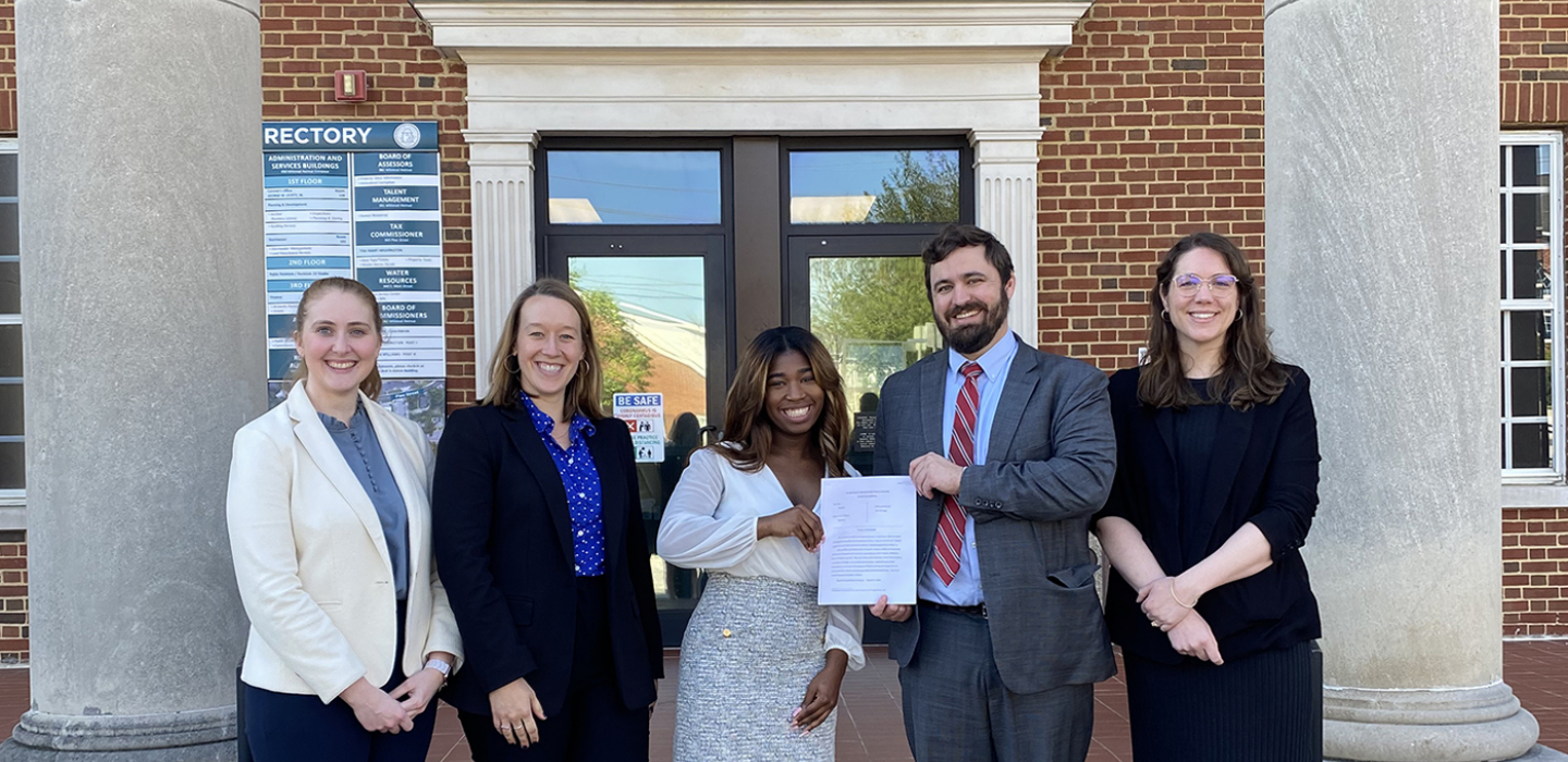 Wilbanks CEASE clinic team in front of the courthouse