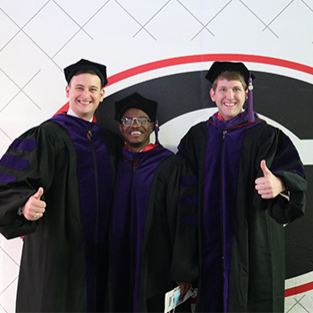 three Class of 2021 graduates