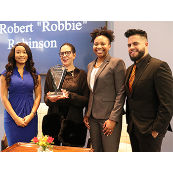 three robinson scholars with Ann Robinson