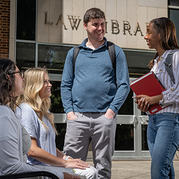law school students in front of library
