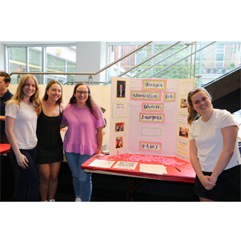 four GAWL members at the student organization fair