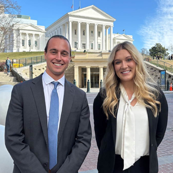 Image of third-year students Poppe and Stablein outside the U.S. Court of Appeals for the Fourth Circuit