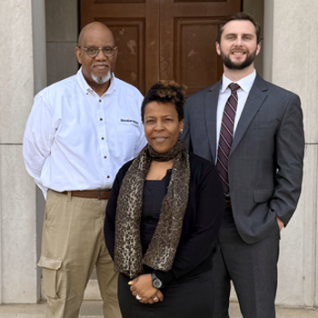 Pictured (l. to r.) are Education Matters’ Richard Dunn, School of Law Associate Dean Andrea Dennis and third-year law student Caleb Morris.