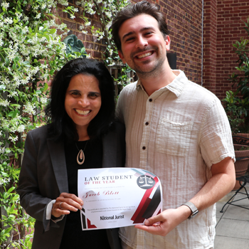 Dean Rodrigues stands with award-winner Jacob Blott