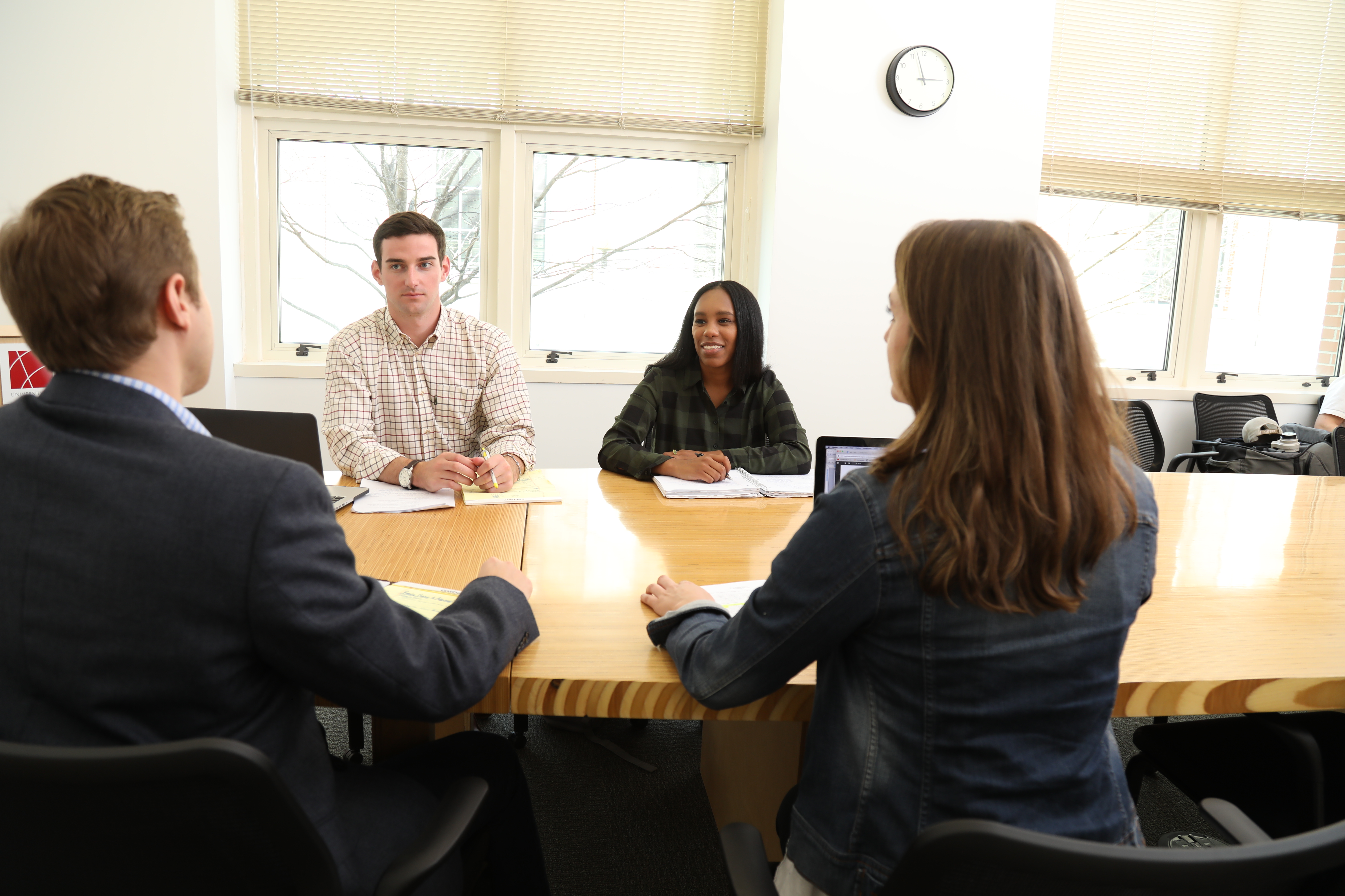 Photo of students in conference room